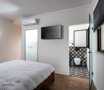 תכנון ועיצוב פנים של בית בצופית,חדר שינה מבט נוסף, ענבל קרקו עיצוב פנים ופנג שואי